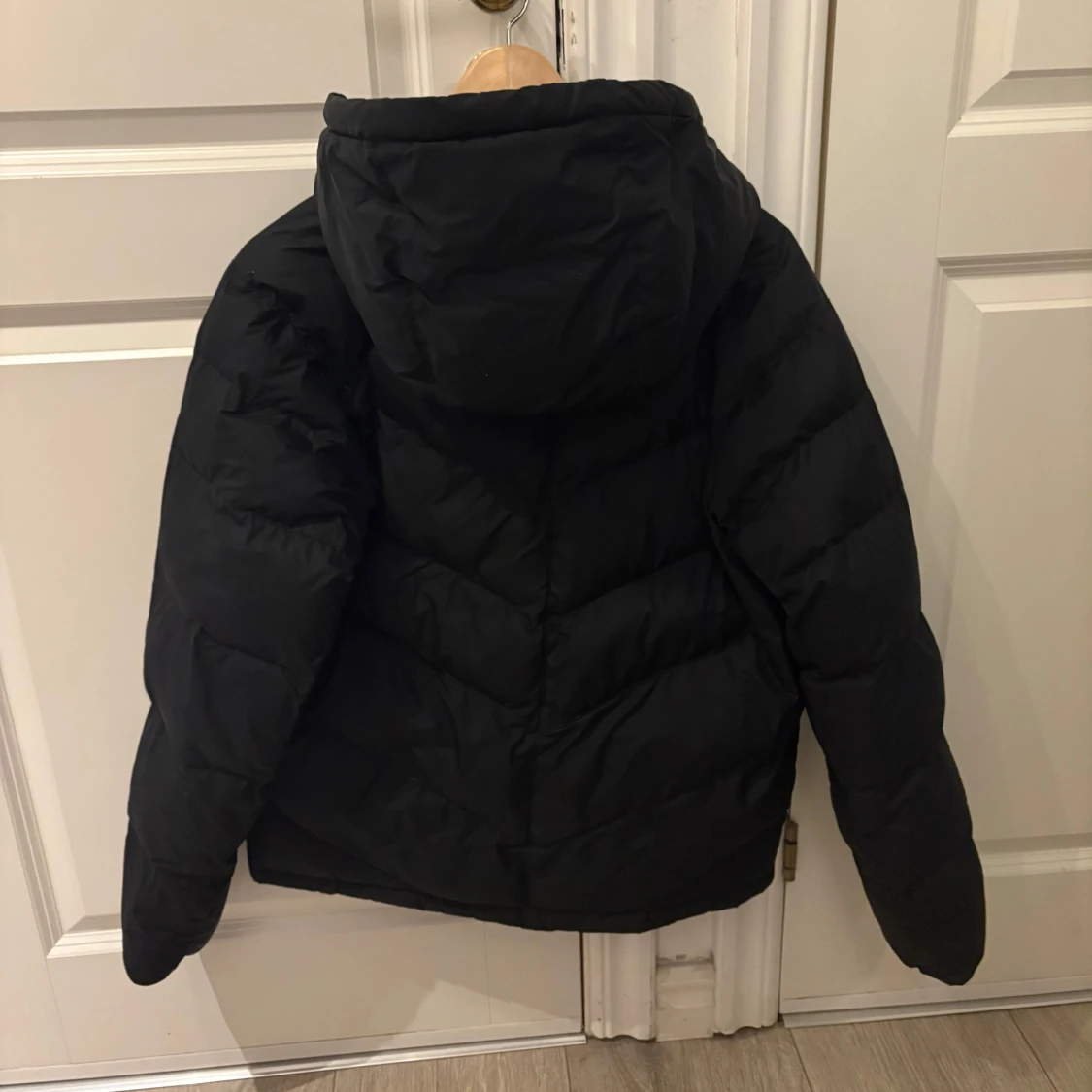 Svart dunjacka från The North Face - 90