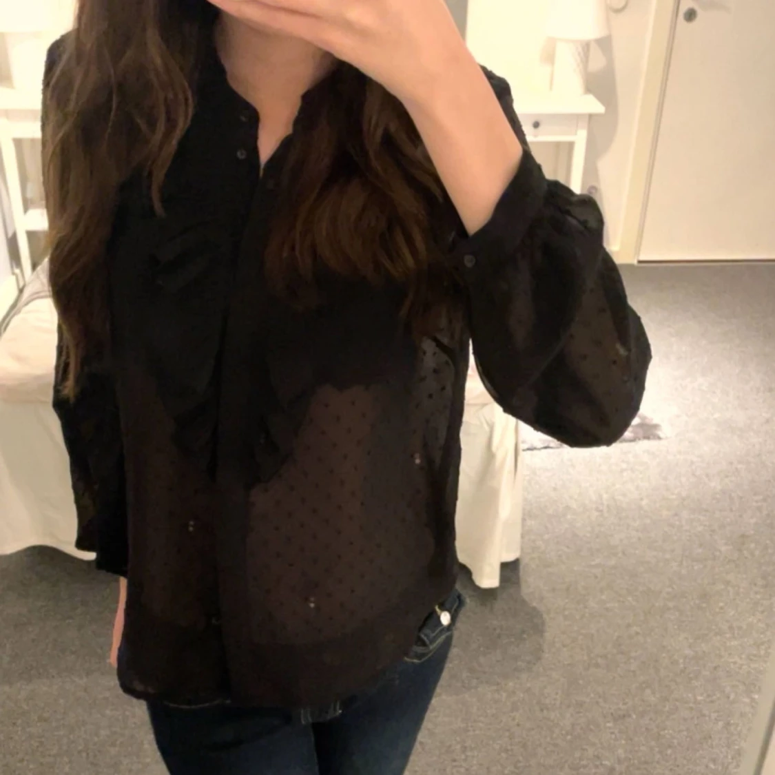 Svart blus med fina detaljer 