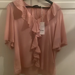 Rosa blus - En jättefin rosa blus från Carin Wester. Aldrig använd!