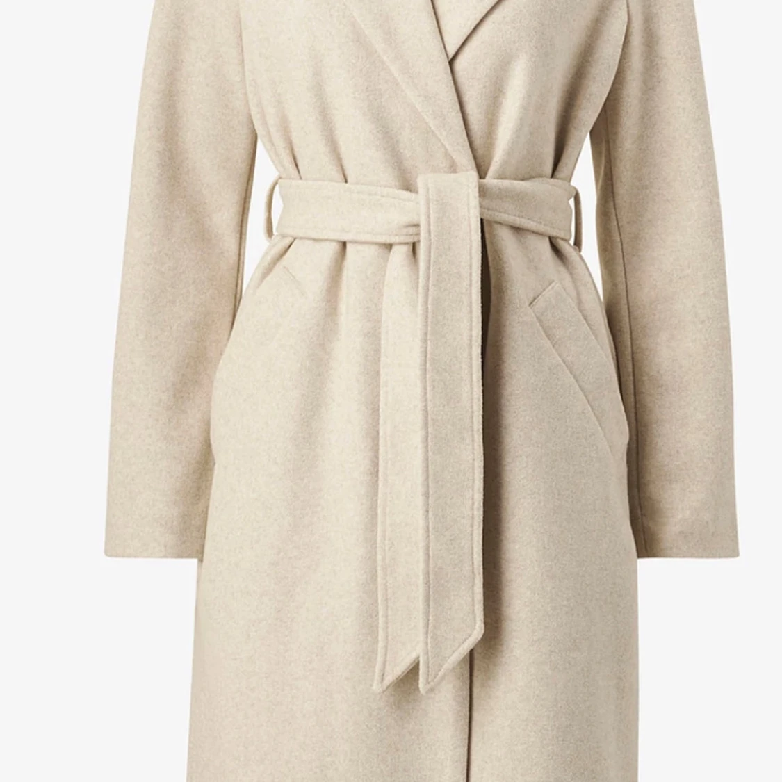 Beige kappa med bälte