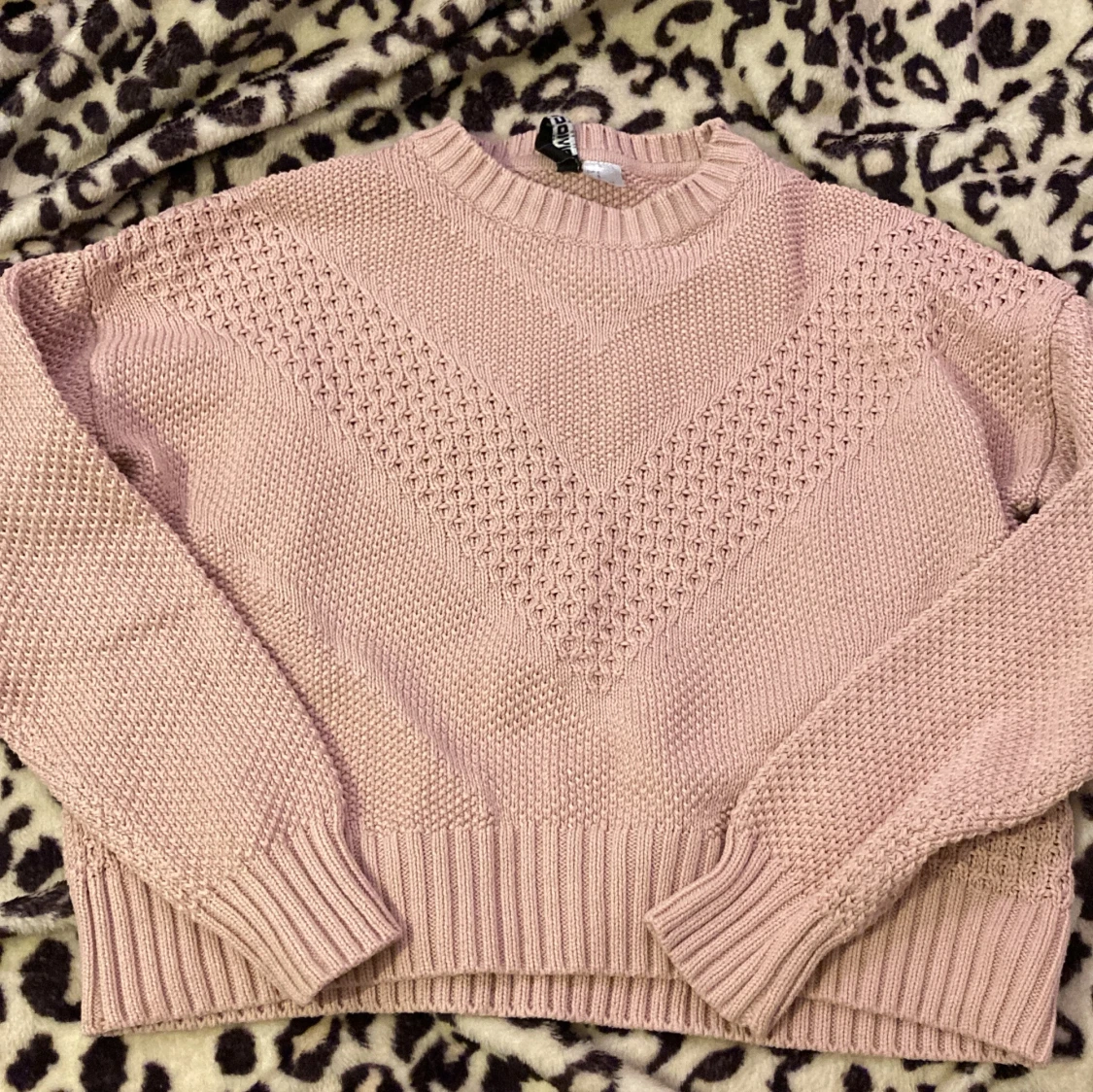 Rosa stickad tröja från H&M