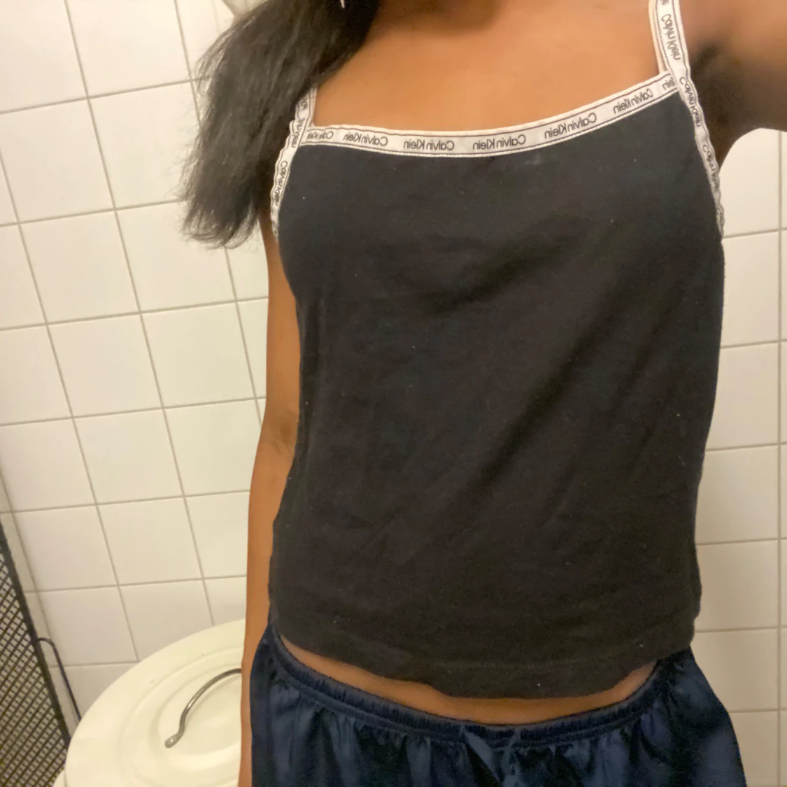 Svart linnetopp från Calvin Klein