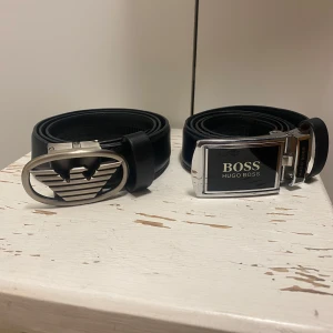Hugo Boss & Armani  - Säljer dessa 2 bälten för att dom inte passar runt min midja längre. Köper du 1 kostar det 200, köper då båda får du de för 300, alltså 100 kronor rabatt.