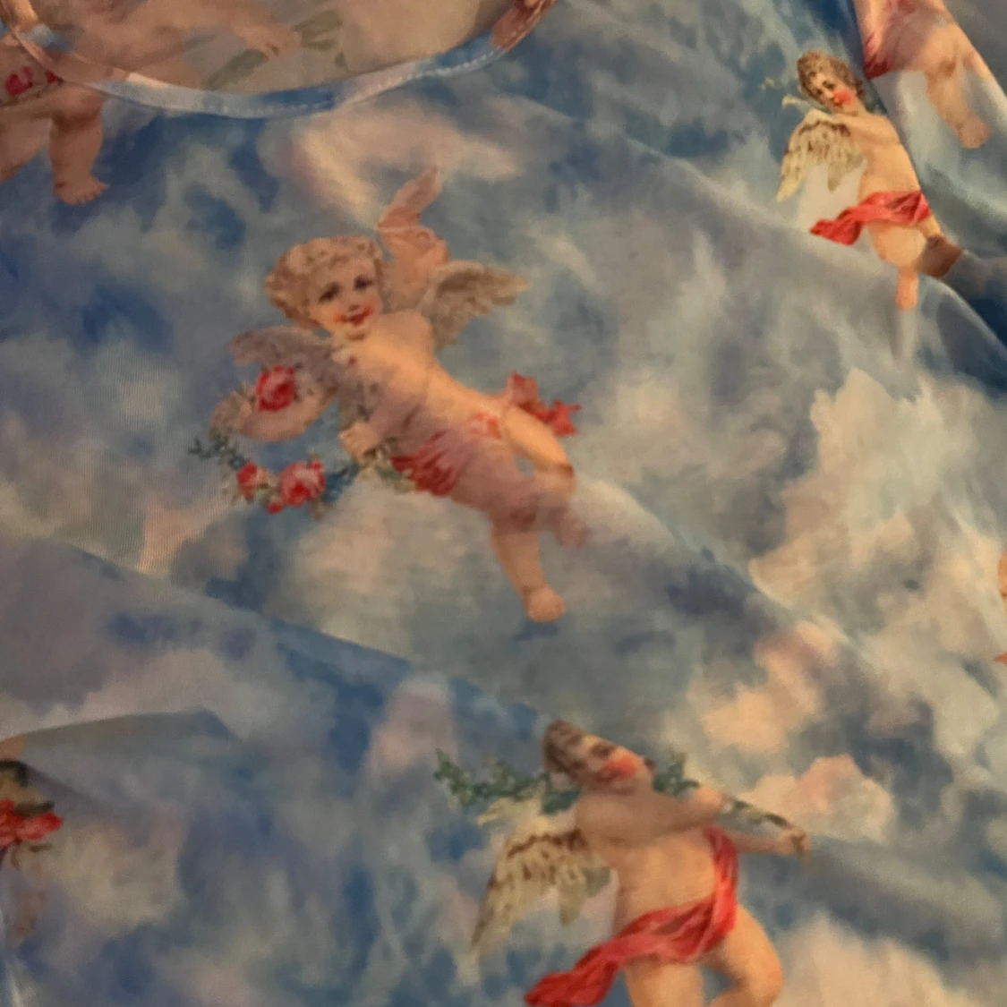 Blå långärmad topp med änglamotiv  - 90