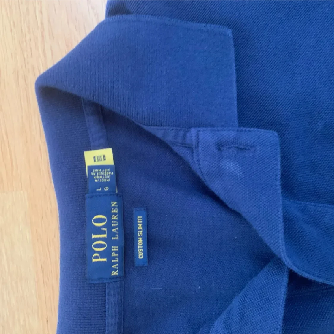 Blå pikétröja från Ralph Lauren - 90