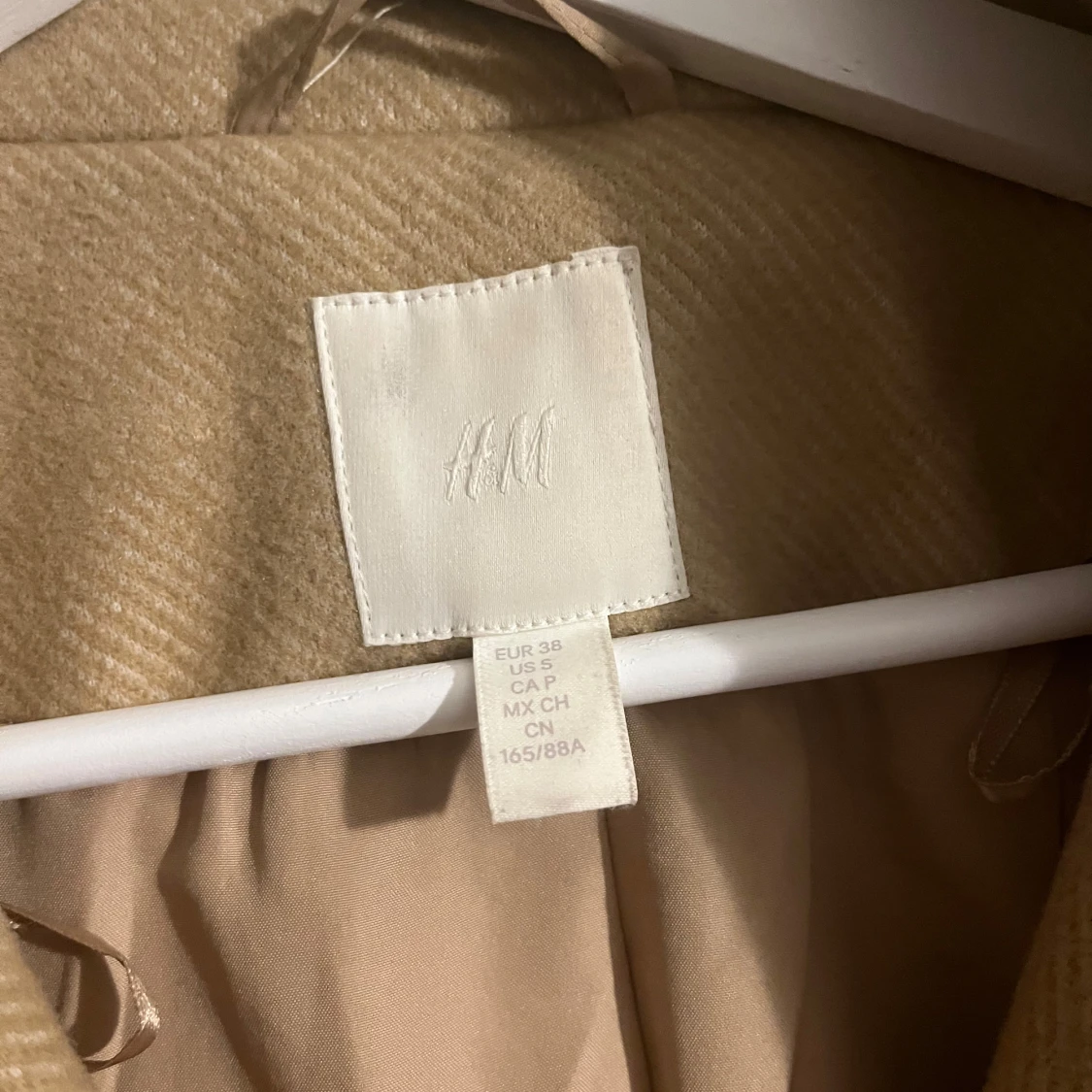 Beige kappa från H&M - 92