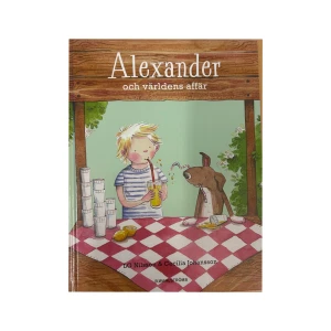 Alexander och världens affär - En charmig barnbok om Alexander och hans äventyr vid världens affär. Boken har en färgglad framsida med illustrationer av Alexander och en hund vid ett bord med rutig duk. Perfekt för unga läsare som älskar äventyr och vänskap.