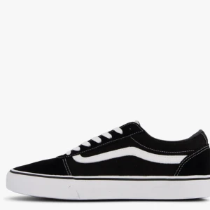 Vans original  - Säljer ett par klassiska svarta sneakers med vit sula och snörning. Skorna har en vit vågig detalj på sidan och är perfekta för en avslappnad stil.