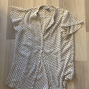 Blus  - Fin blus som används två gånger tidigare 