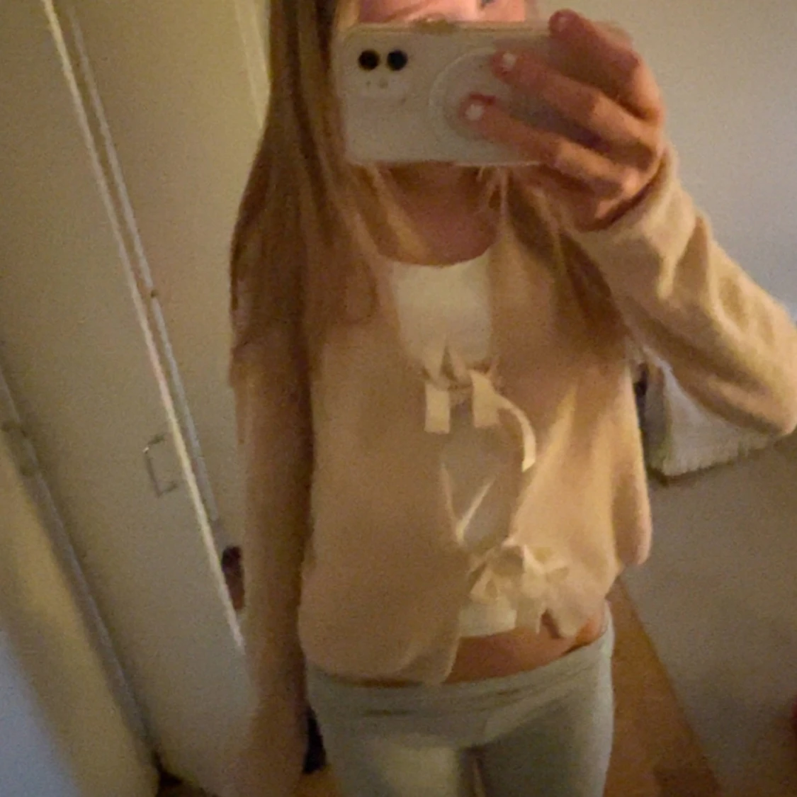 Ljusrosa kofta med rosetter - 1