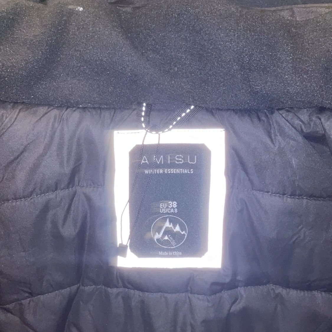 Svart dunjacka från Amisu - 92
