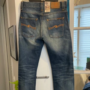 Blå jeans från Nudie Jeans - Helt nya jeans från nudie med galen wash. Avarage Joe 28/32
