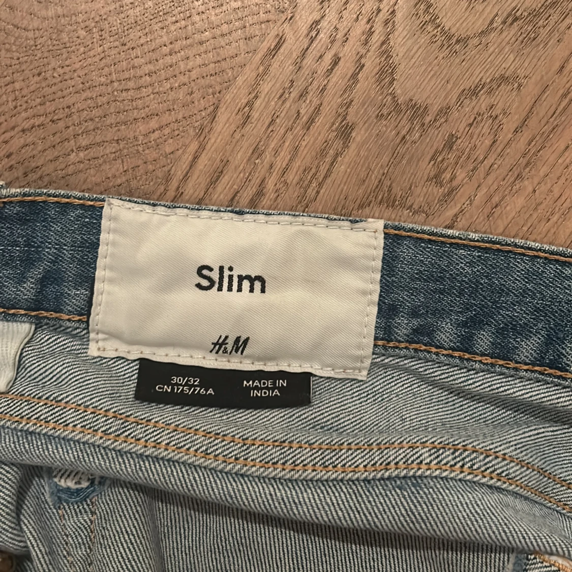 Blå slim jeans från H&M - 30