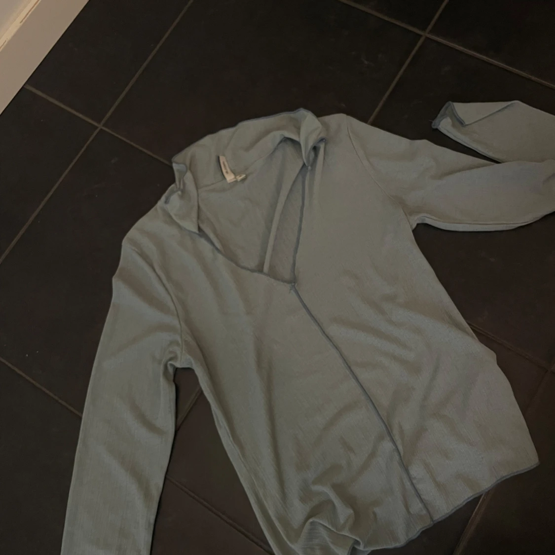 Ljusblå långärmad tröja