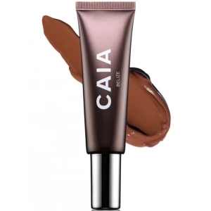 CAIA Flytande Bronzer - Flytande bronzer från CAIA i en elegant tub. Ger en solkysst look med en mjuk och jämn finish. Perfekt för att framhäva ansiktets konturer. Självklart helt ny
