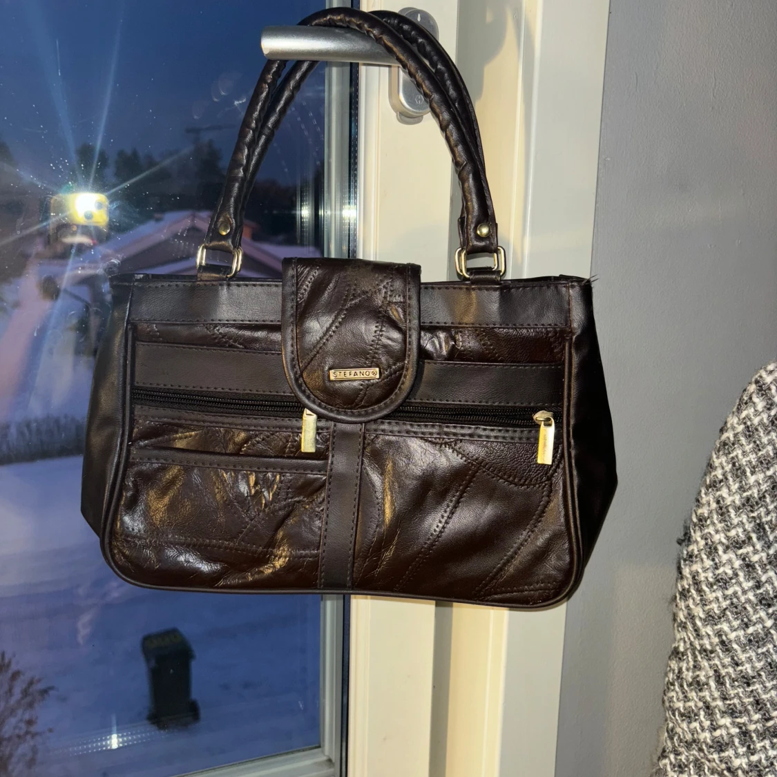 Brun handväska från Delmano