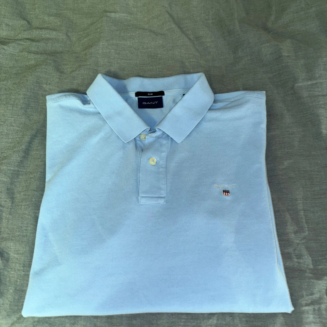 Ljusblå pikétröja från GANT - 91