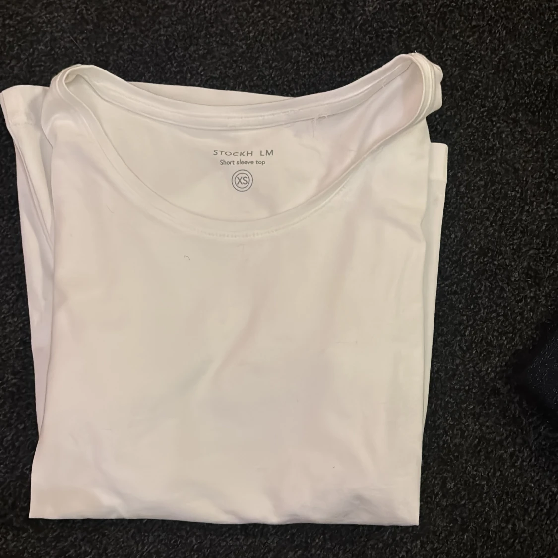 Vit t-shirt från Stockh LM