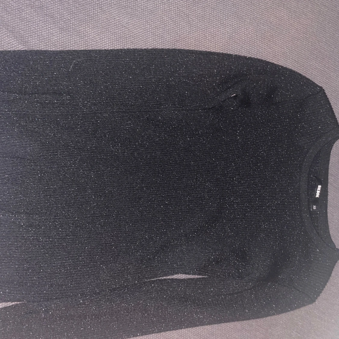 Glittrig tröja  - 91