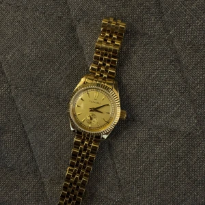 Mockberg guld klocka 28mm - Nytt skick  Oanvänd  Nypris 2400:-