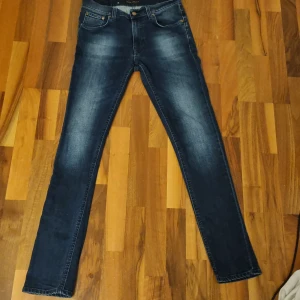 Nude jeans W31 L32 - Säöjer ett par snygga Nudie jeans av modellen Lean dean. Gott skick 4/5. Nyoris ca 1600.