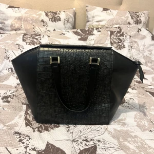 Handväska - Den har en jätte bra skick och använts ett par gånger