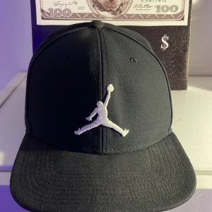 Michael Jordan keps, svart  -  använd fåtal gånger bra kvalitet. och den äkta