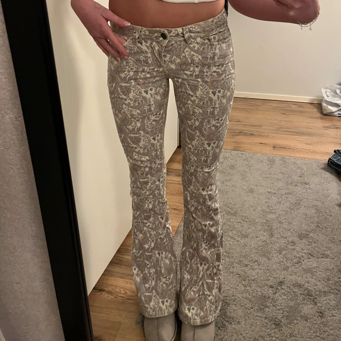 Mönstrade bootcut byxor