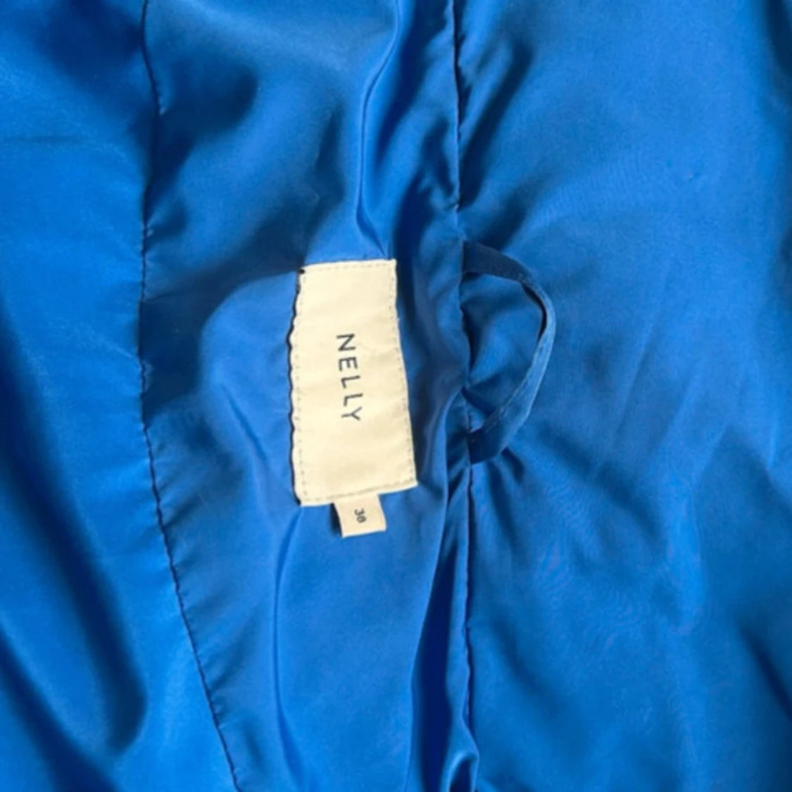 Blå pufferjacka från Nelly - 91
