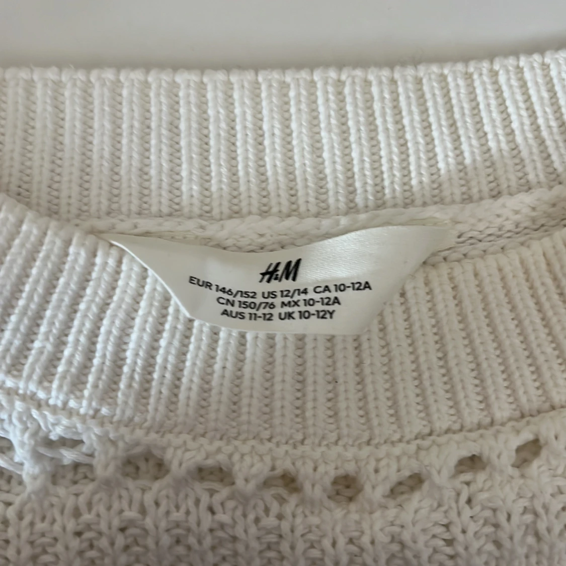 En vit virkad tröja från HM - 91