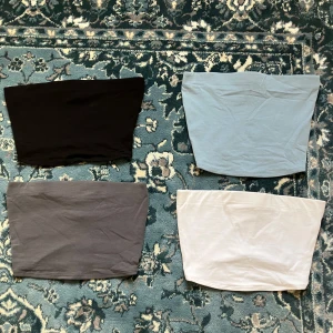 Tubtoppar - Fyra Tubtoppar i färgerna blå, svart, vit och grå från HM 💕100kr för alla fyra