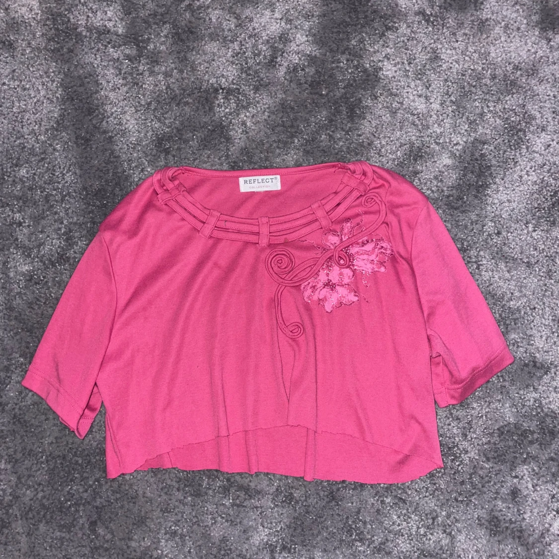 Rosa topp från Reflect
