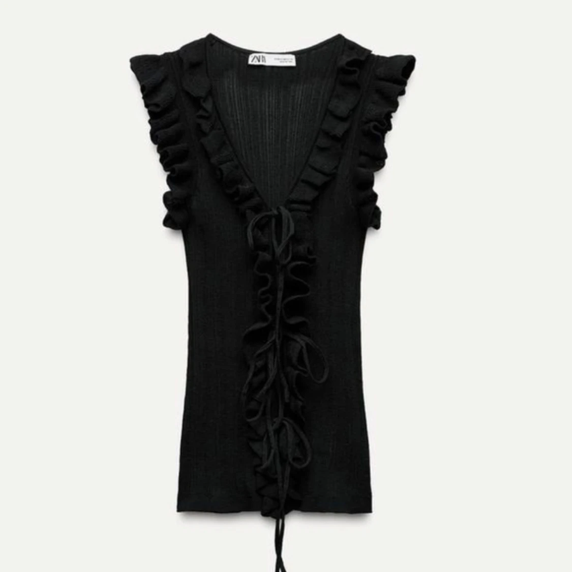 Svart ribbad topp från Zara