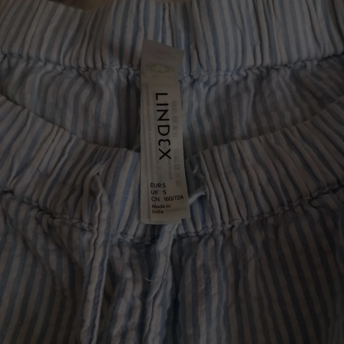 Randiga byxor från Lindex - 92