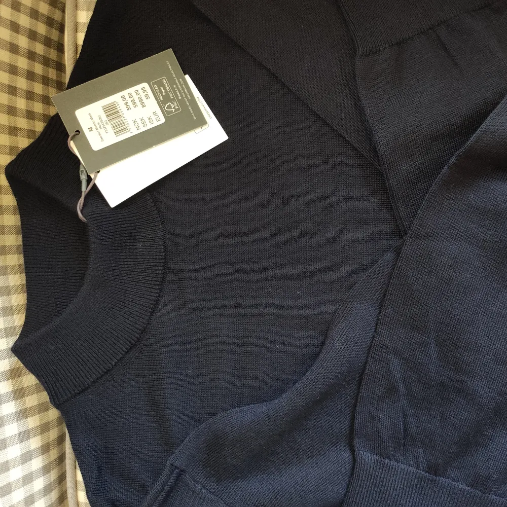 New sweater merino mock neck New price 599kr Dark blue . Stickat.