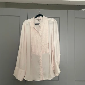 Lång skjorta  - Baby rosa skjorta 