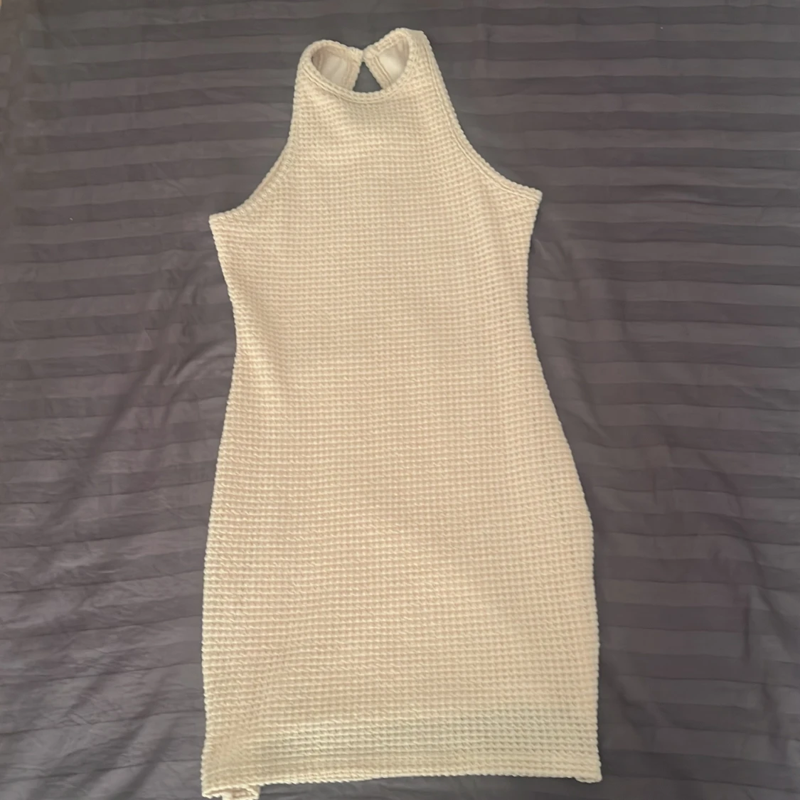 Kort stickad klänning