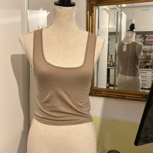 Brunt linne - Kort, brunt linne från H&M, storlek S