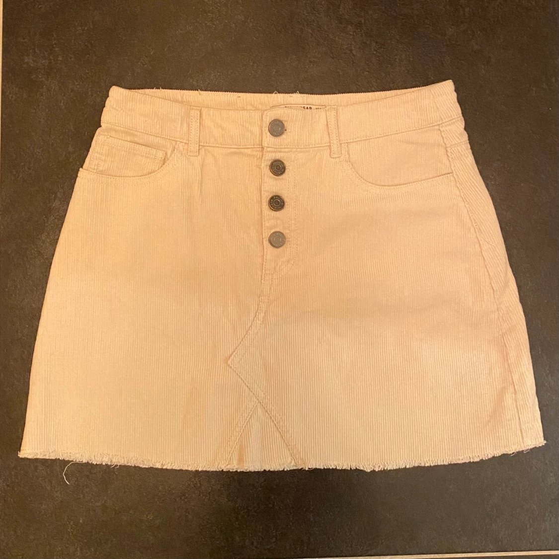 Manchester kjol beige stl M