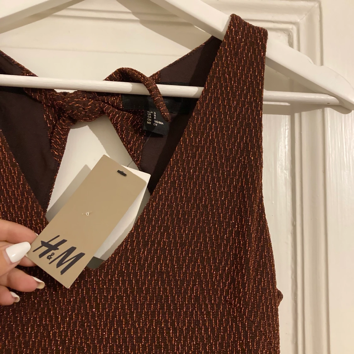 Glittrig kopparfärgad långklänning