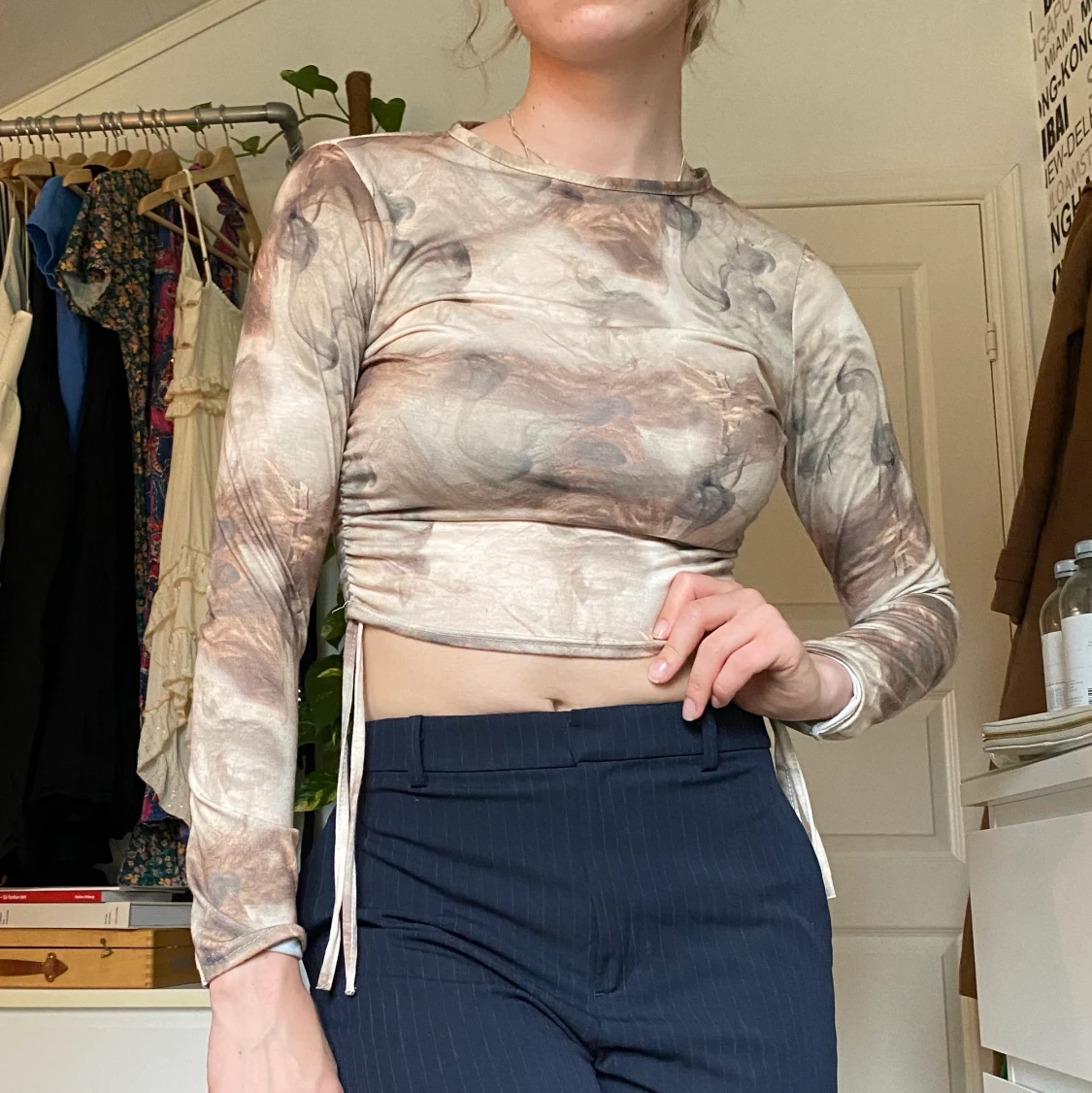 Spräcklig beige topp i stl 36/38