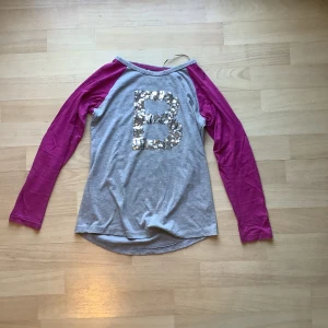 Långärmad tröja  - En superfin långärmad tröja från EQUIPE fashion i storlekarna 146-152.