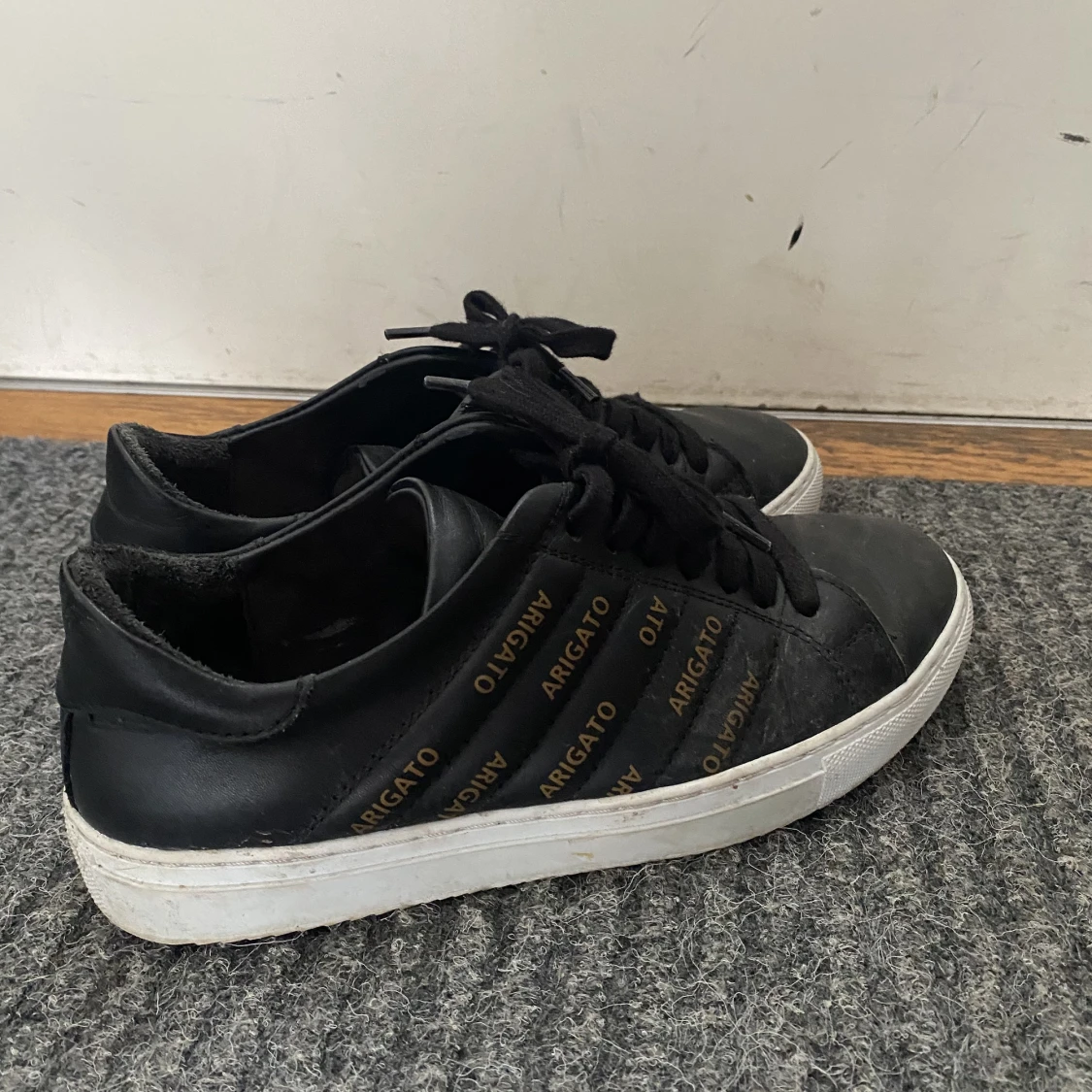 Axel Arigato skor  - 90