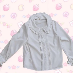 Peter pan collar button up shirt - Kawaii button up peter pan collar shirt. Comes with a pink lace. Looks very good with the blue cardigan on top 💕 Originally from aliexpress. In perfect condition