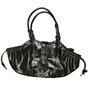 **SOLD** Vegan leather handbag with western style clasp. Clean and fresh interior without any signs of use
