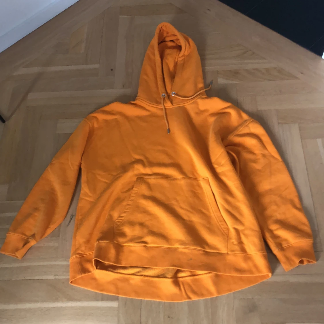 orange peak performance hoodie