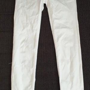 Vita snake jeans - Stretchiga tighta jeans, hög midja