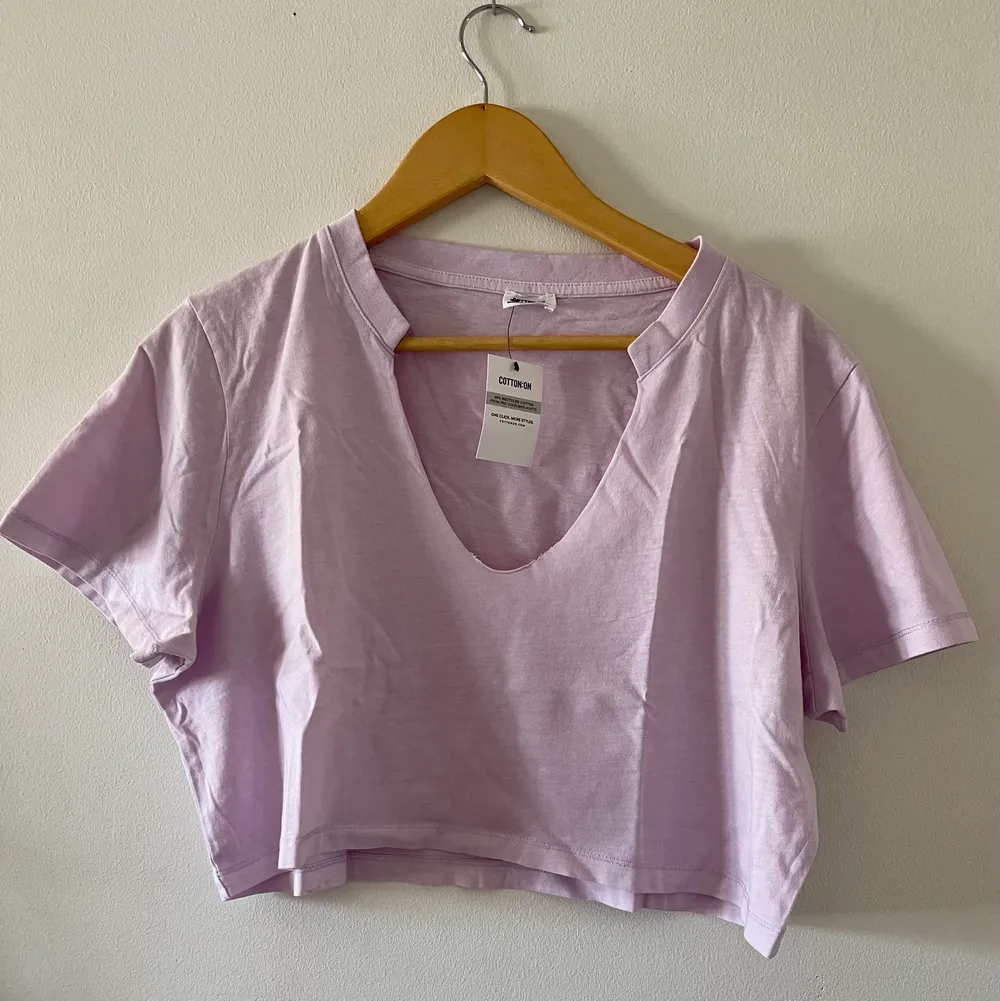 brand new cotton:on sports t shirt. super baggy and brand new with tag. Selling it because it’s too big on me 😔. Made from recycled cotton and is very soft 💗.The color is light purple/lilac/lavender 🥰.  Got it from Asos!!. T-shirts.