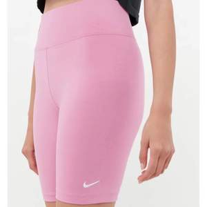 Pink Nike biker shorts. There is a faint stain on the left side on the waist band of the short seen in the last picture 