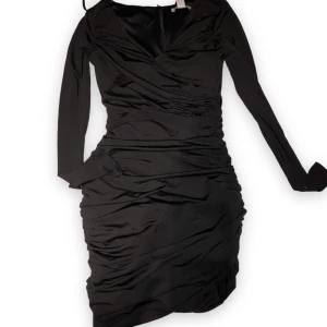 Klänning  - Klänning från nelly, figur sydd. Storlek xs 